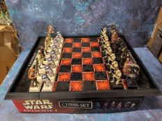 A Star Wars Episode I Chess Set, complete in original packaging; Star Wars Risk; a Star Trek Klingon