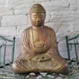 A reconstituted stone Buddha garden statue