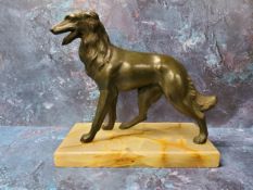 Art Deco, 1930, a green patinated spelter Borzoi, rectangular onyx base, 18cm high, 20cm wide