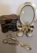 A silver oval easel photograph frame, 17cm high, Birmingham marks rubbed;  a pair of Victorian opera