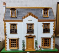 A large 20th century doll's house, Leighton House, 70cm high, 79cm wide