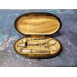 A Victorian oval sewing  necessaire, the interior fitted with silver thimble, scissors, bodkin case,