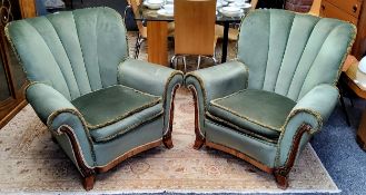 A pair of Art Deco walnut emerald green shell back club chairs c.1930