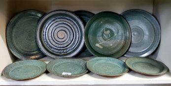 Studio Pottery - in powder blue comprising  five dinner plates, four side plates;  etc