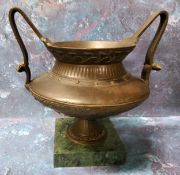 A 19th century Grand Tour bronze mantel urn, cast with stylised foliage, high handles, square