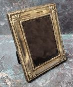 A silver rectangular easel photograph frame, anthemion to angles, 12cm x 10cm, Sheffield 1996