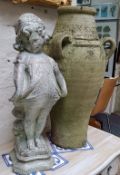 A reconstituted garden ornament of a bashful little girl and a large amphora vase (2)