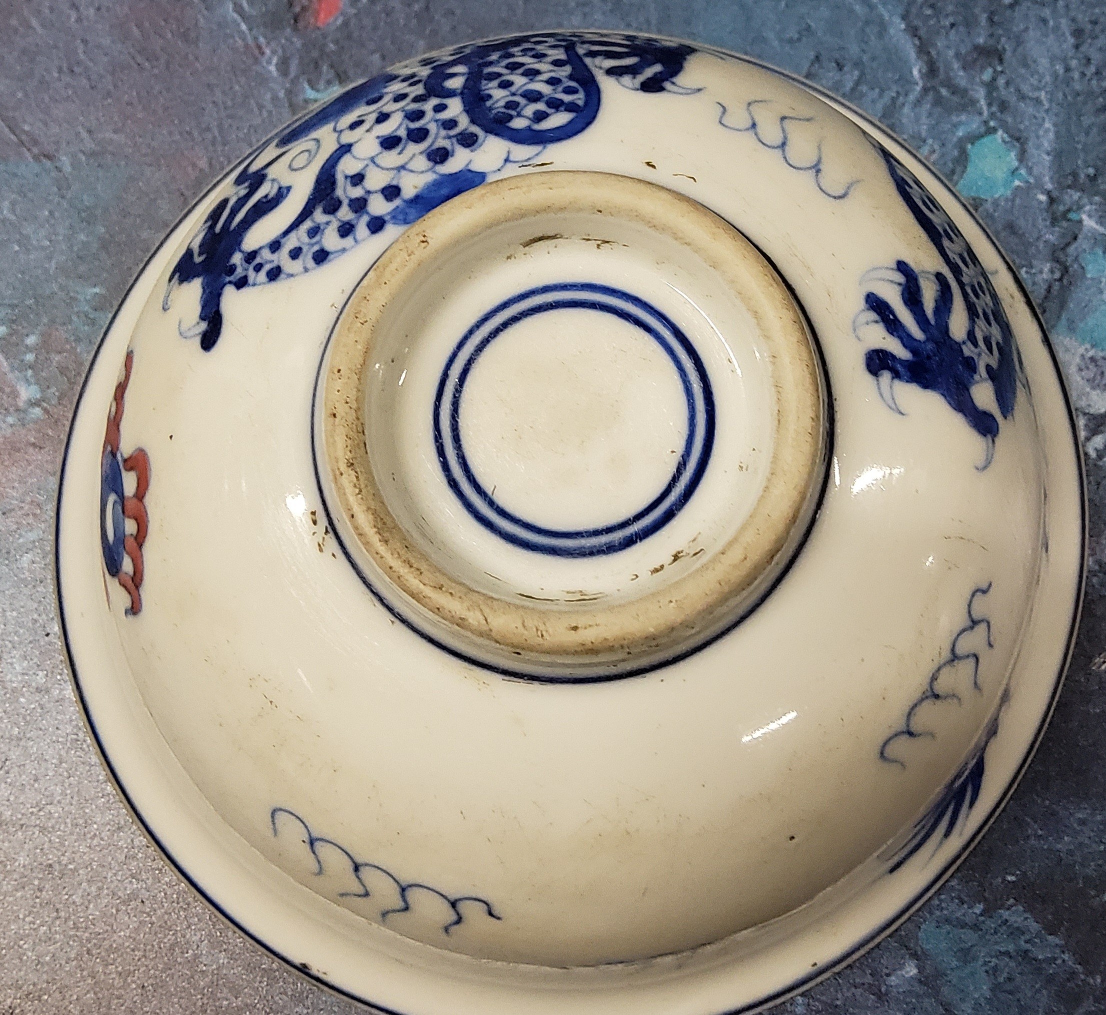 A 19th century Chinese bowl, the exterior in cobalt blue with the dragon chasing the flaming - Image 2 of 4