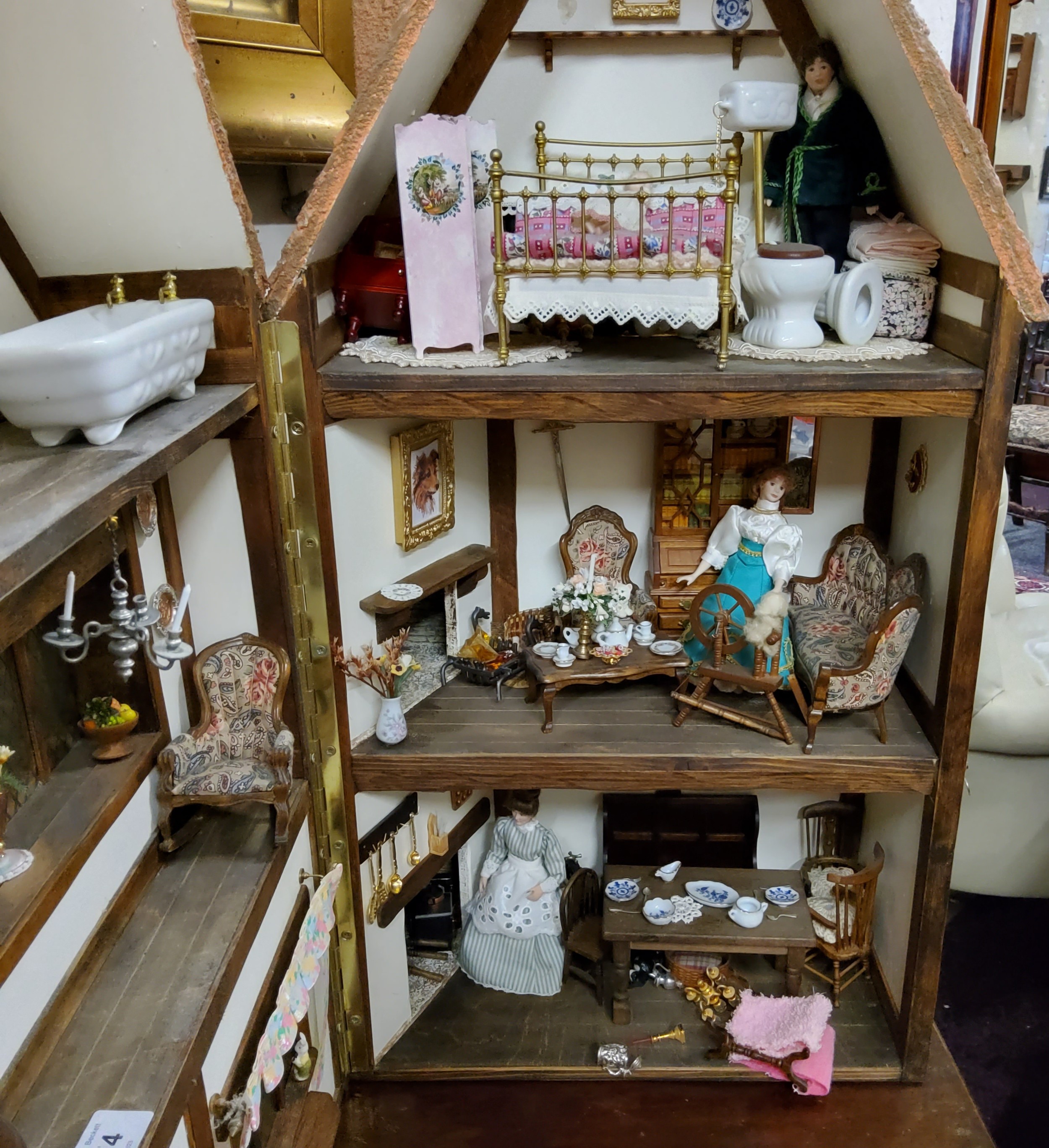 A large 20th century doll's house, Tudor House, three story, with furniture, accessories and - Image 2 of 2