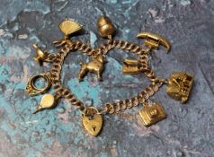 A 9ct gold charm bracelet with ten 9ct gold charms including a hinged pub, camera, poodle etc, 9ct