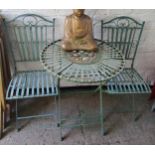 An outdoor folding metal bistro set