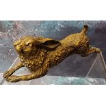 An Austrian cold painted bronze, of a running hare, 11cm long, c.1870