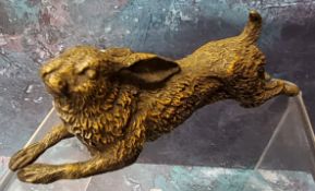An Austrian cold painted bronze, of a running hare, 11cm long, c.1870