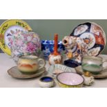 A Japanese Imari plate;  a Japanese blue and white bowl  Kutani bottle vase;  stoneware mugs and