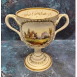 A Victorian Coalport type  two handled loving cup, painted with landscape cartouches within a gilt