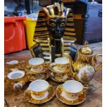 A large ceramic Tutankhamun pharaoh mask, 34cm high, signed Zauotto;  a Bondware gilt coffee service