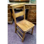 Early 20th century ash and elm chapel chair, hymn sheet section to back splat c.1900