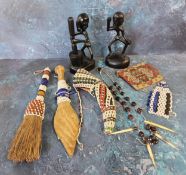 African Art - ebonised figures;  beadwork brush, horn and and spear;  a porcupine and bead necklace;