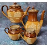 A Royal Doulton stoneware teapot, milk jug and sugar bowl, each sprigged in white with jolly topers,