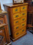 A good Victorian flamed satinwood and mahogany campaign chest of two short above four graduated