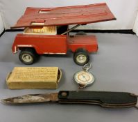 A Tin Plate  Escuderia Sansun truck, red livery;   a pen knife;   a map measurer, boxed (3)