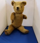 An early 20th century 20th century jointed mohair bear, horizontal stitched snout, medium sized