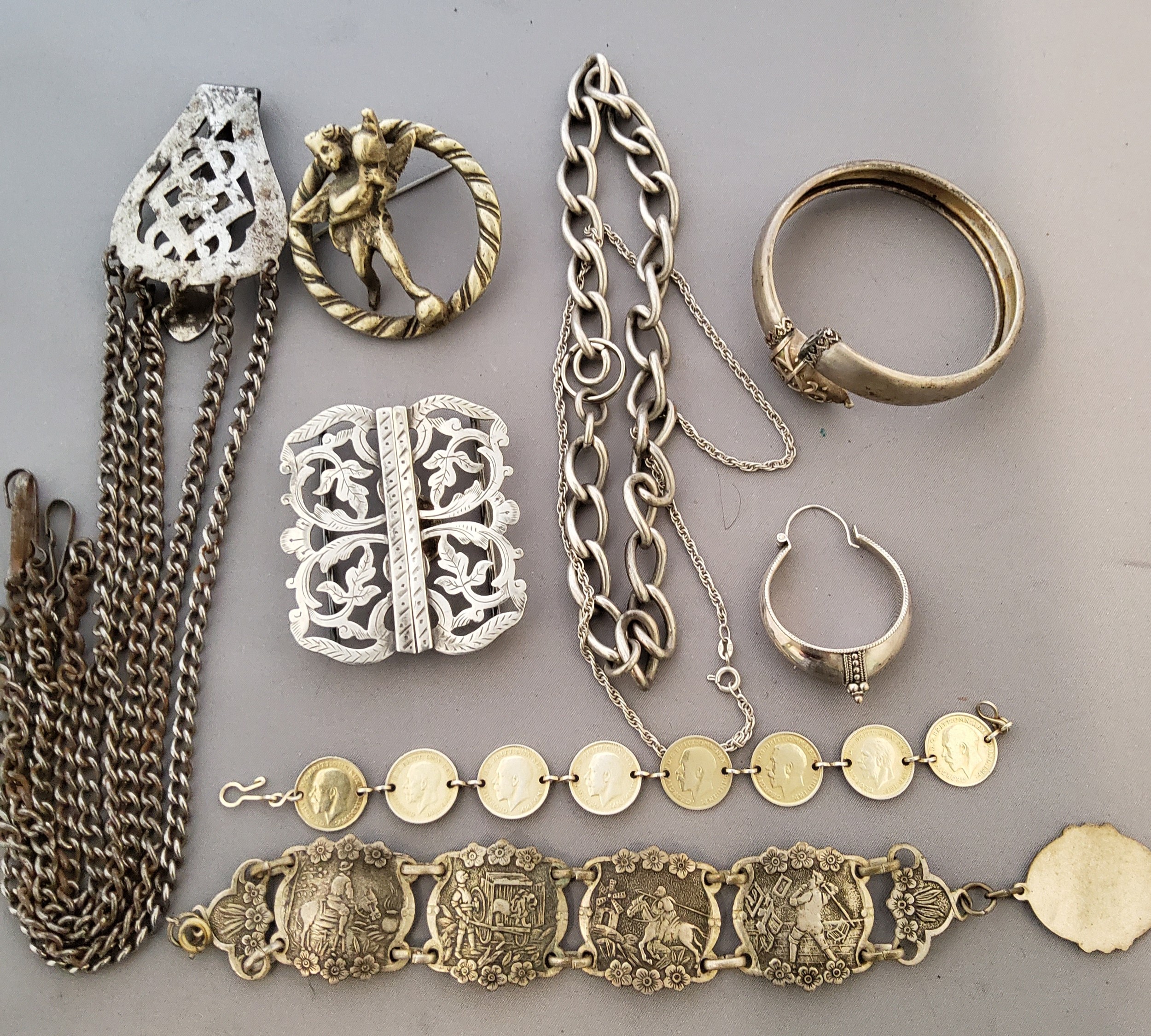 An EPNS nurses buckle;  a chatelaine chain;  George V 3d bracelet;  etc