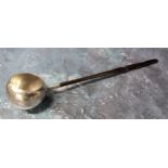 A 19th century Scottish silver plated toddy ladle, wrythen handle, the globular bowl engraved,