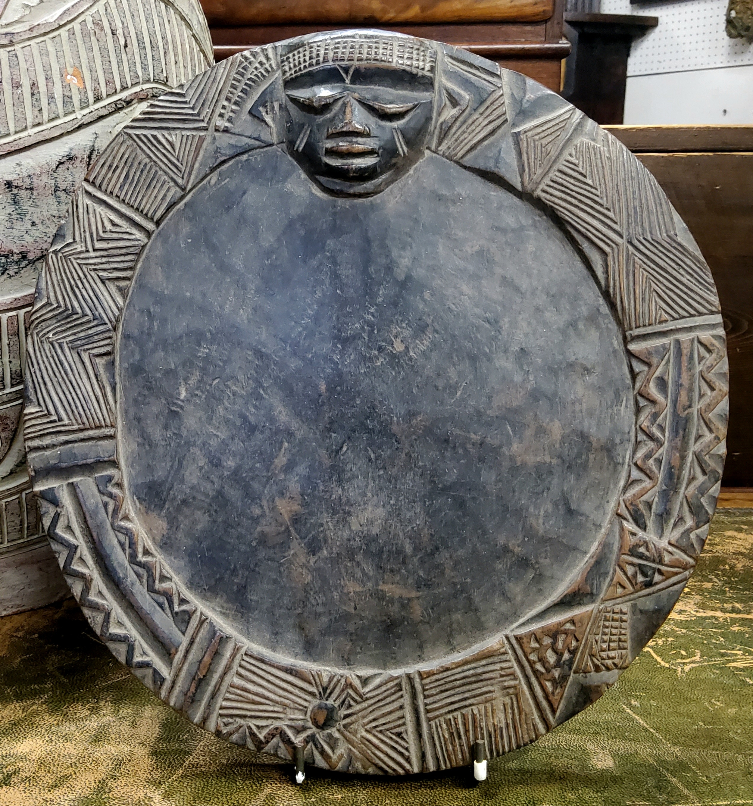 Tribal Art - A Yoruba ifa divination tray, late 19th/ early 20th century, bold geometric panel