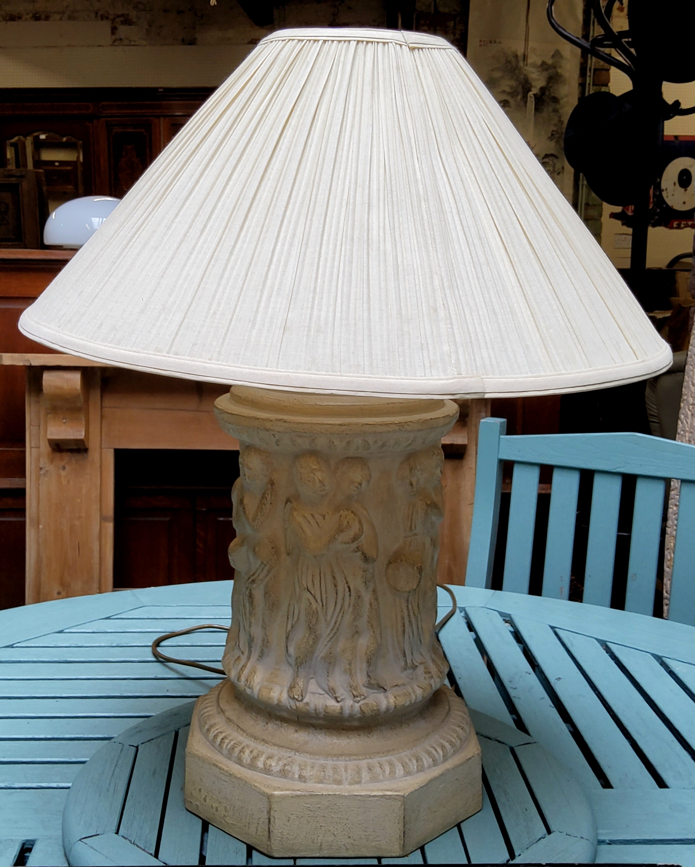 A contemporary table lamp, decorated in relief with classical figures by Casual Lamps, faux