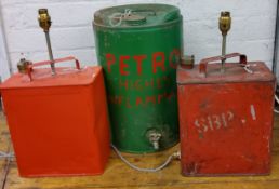 An SM and BF Ltd petrol can, painted red, now converted to a side light, 45cm high;  another;  a