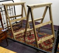 Late 19th century limed oak coffin stands, approximately 4ft tall