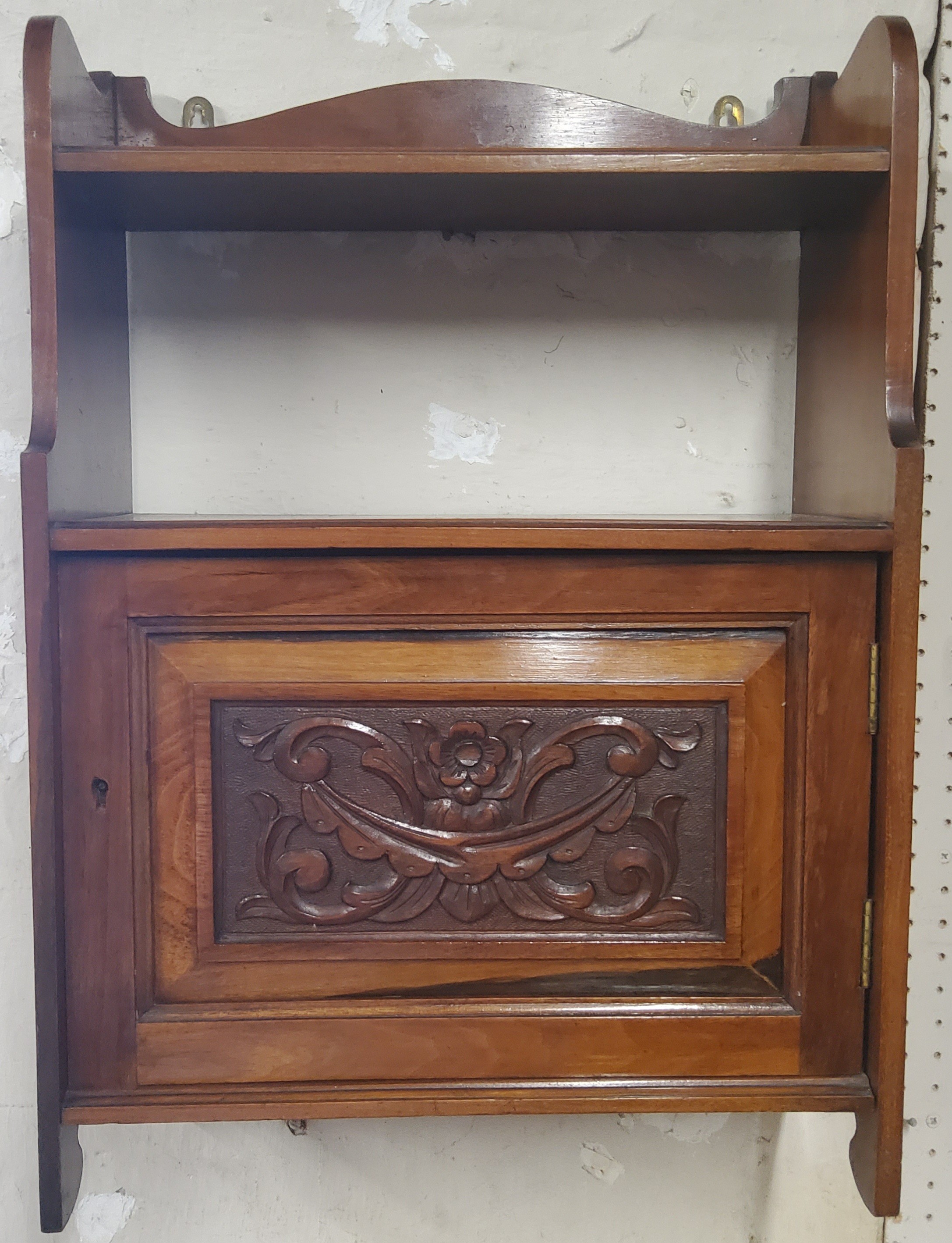 A Victorian walnut wall cabinet, with shaped gallery above open shelf, carved fielded panelled door, - Image 2 of 2