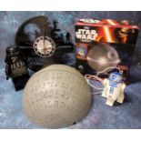 A Star Wars Lego Darth Vader alarm clock, 24cms; a boxed Star Wars Science Death Star Planetarium; a