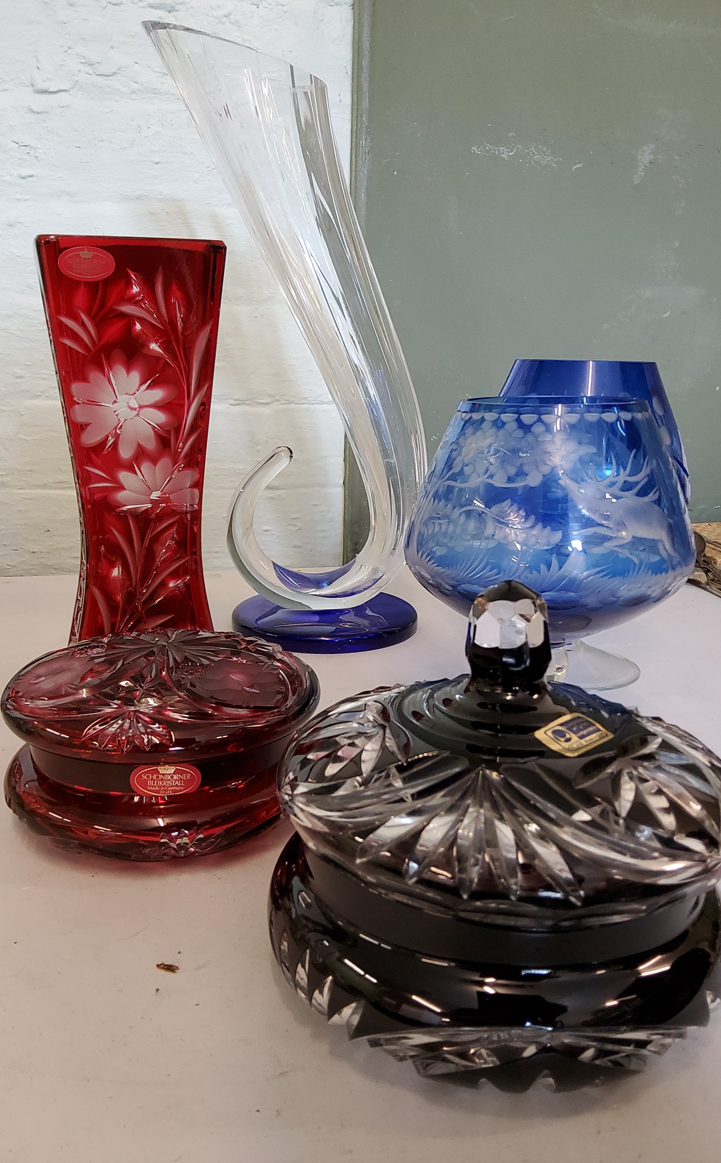 An Italian Art Glass cornucopia vase, blue base, 40cm high;   Schonborner red overlaid vase,