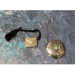 An E.P.N.S. circular chatelaine compact, the cover with enamelled crest for Bridgwater, 5cm diam;  a