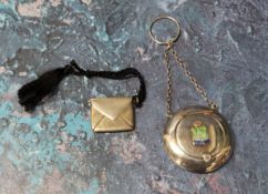 An E.P.N.S. circular chatelaine compact, the cover with enamelled crest for Bridgwater, 5cm diam;  a