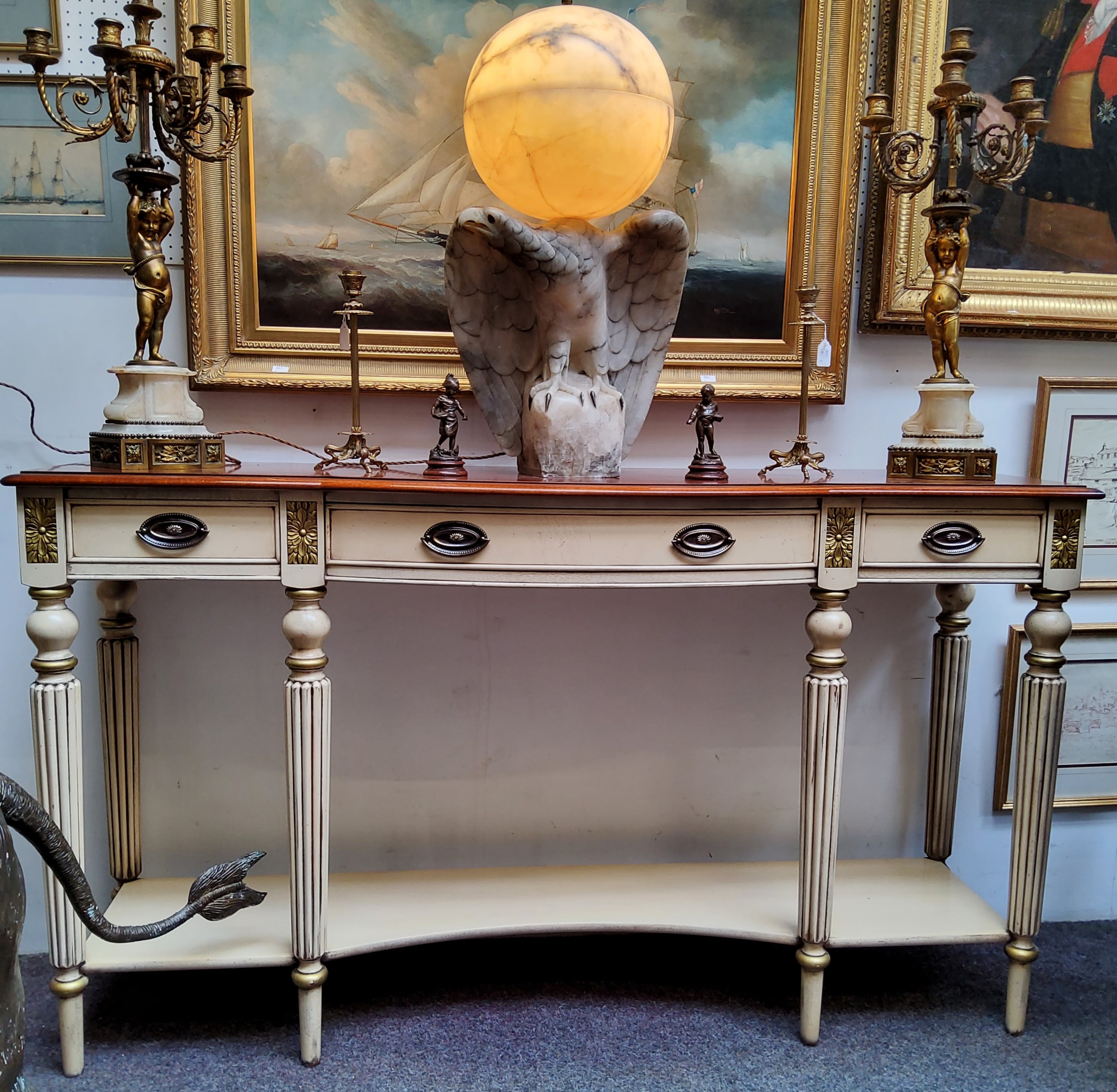 A Louis XVI style sideboard, mahogany surface above three drawers to frieze, intermitted gilt - Image 2 of 2