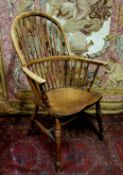 A 19th century ash and elm Windsor chair, spindle back, shaped seat, H stretcher, c.1850