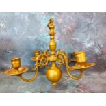 An 18th century Dutch style brass four light ceiling candle holder, 28cm high