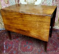 A George III mahogany Sutherland table on fluted tapering legs c.1780