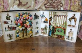 An exceptional example of a Victorian scrapbook album, containing mounted pictorial scraps of
