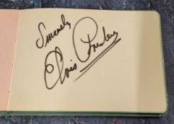 Elvis Presley (1935-1977) - a personal autograph book, a single page signed 'Sincerely Elvis