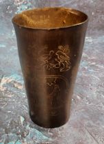 A 19th century horn tapering cylindrical beaker,  sgraffito scrimshaw decorated with a King and