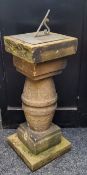 A Derbyshire gritstone sundial. Condition: the carved sections separate into three, for ease of