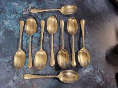 A set of nine silver Hanoverian Rat Tail pattern dessert spoons, Aiken Brothers, Sheffield 1930,