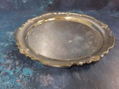 A silver shaped circular tray, anthemion, scroll  and reeded border, 25cm diam, James Dixon and