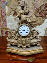 A French gilt metal figural mantel clock, 7cm white enamelled dial, inscribed J B Yabsley, twin