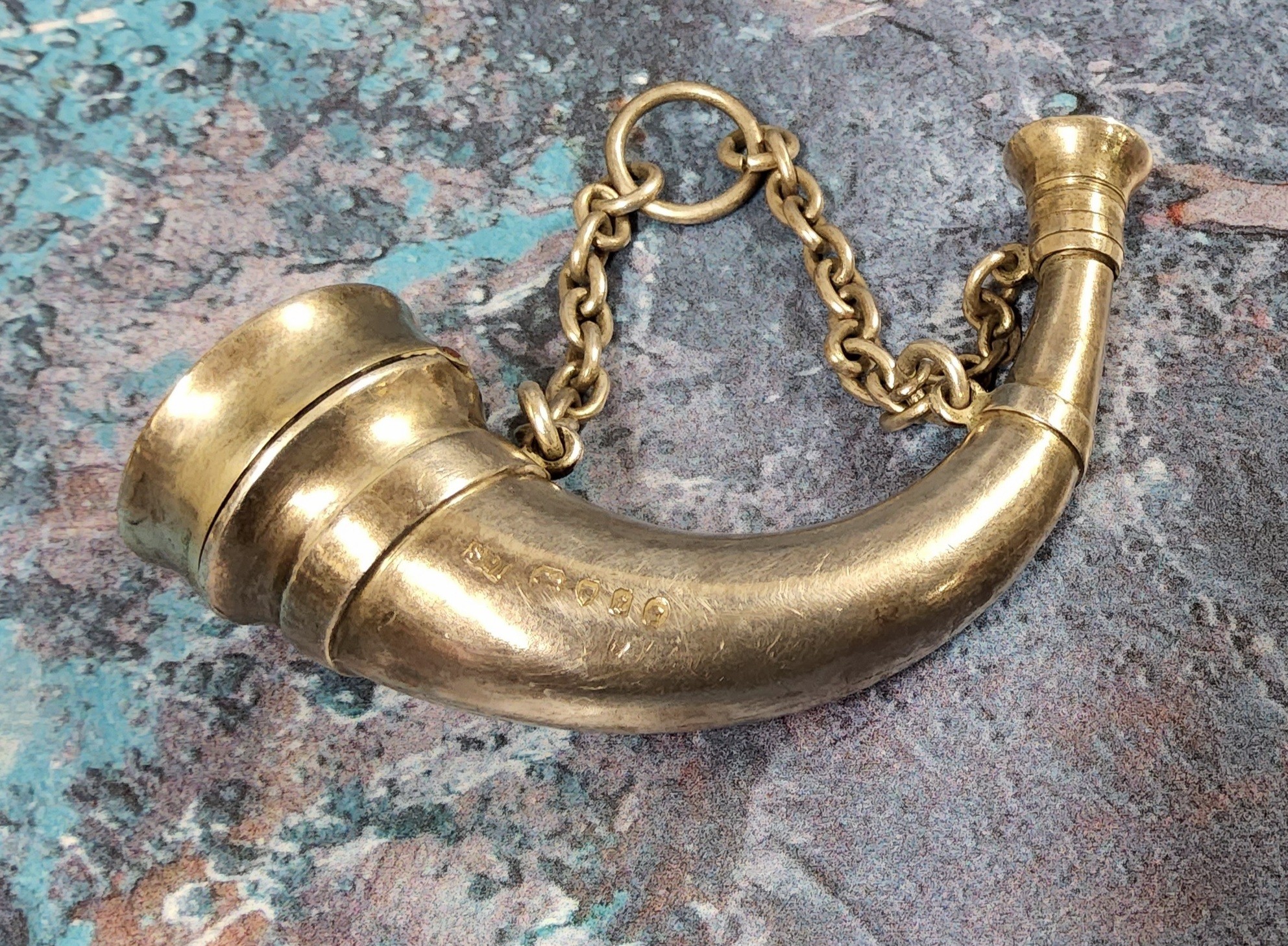 A Victorian novelty silver combination vinaigrette & scent bottle in the form of a hunting horn,