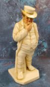 A Royal Worcester figure, modelled by James Hadley, John Bull, in white picked out in gilt, 17.5cm